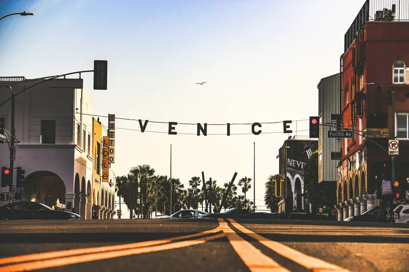 The Venice sign hanging over Windward Avenue